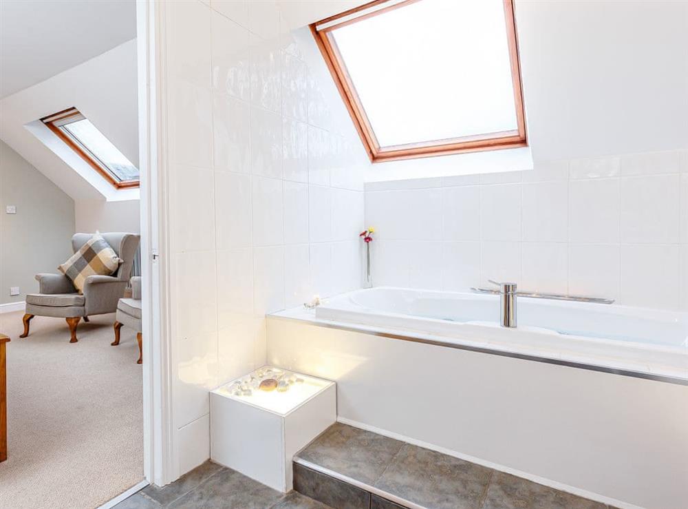 En-suite Bathroom with bath and walk-in shower cubicle (photo 2) at The Garden Wing, 
