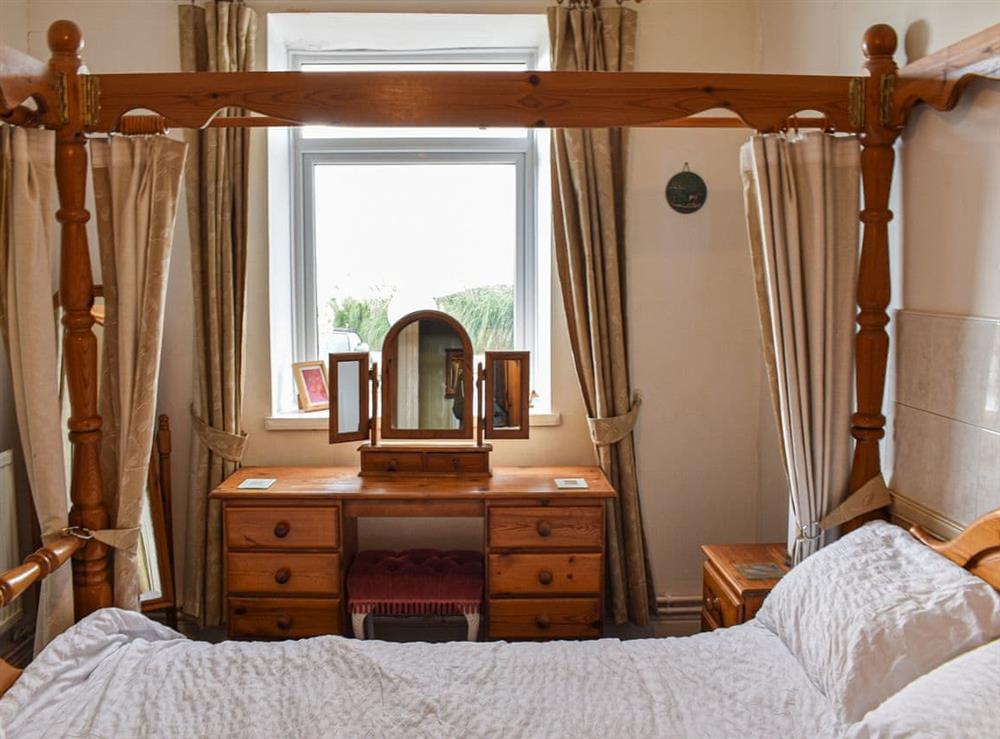 Four Poster bedroom (photo 3) at King Arthur Suite in Trearddur Bay, Anglesey, Gwynedd