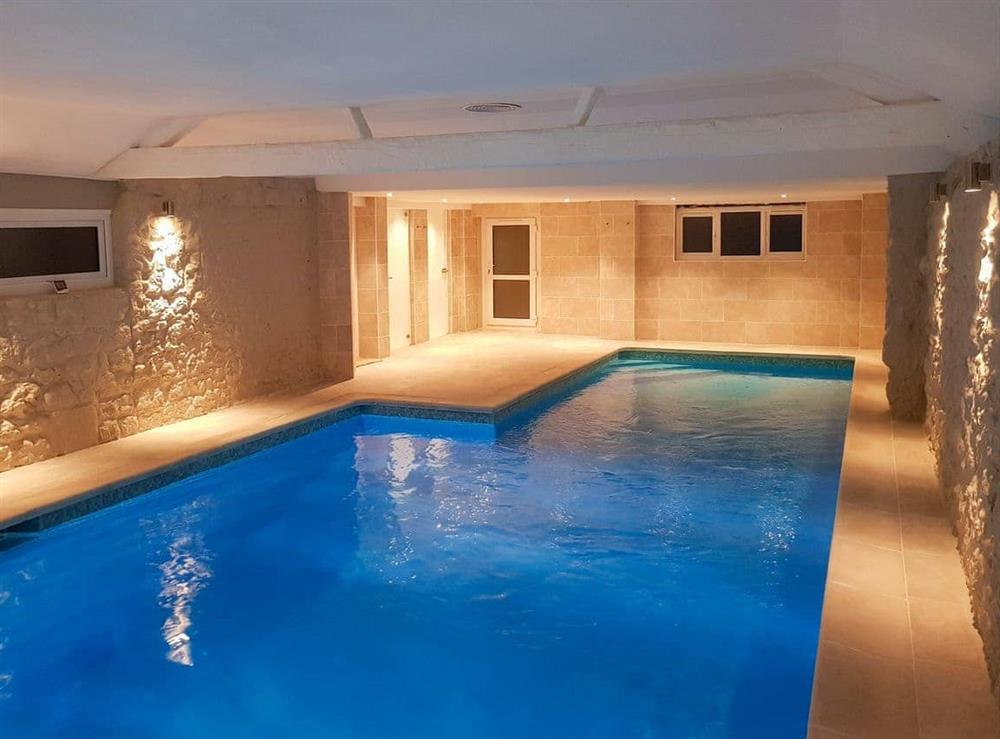Shared indoor swimming pool at The Stables, 