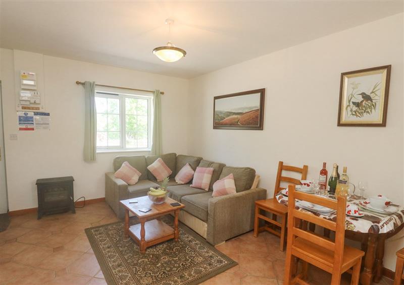 Relax in the living area at Kingfisher Cottage, Bottreaux Mill near South Molton