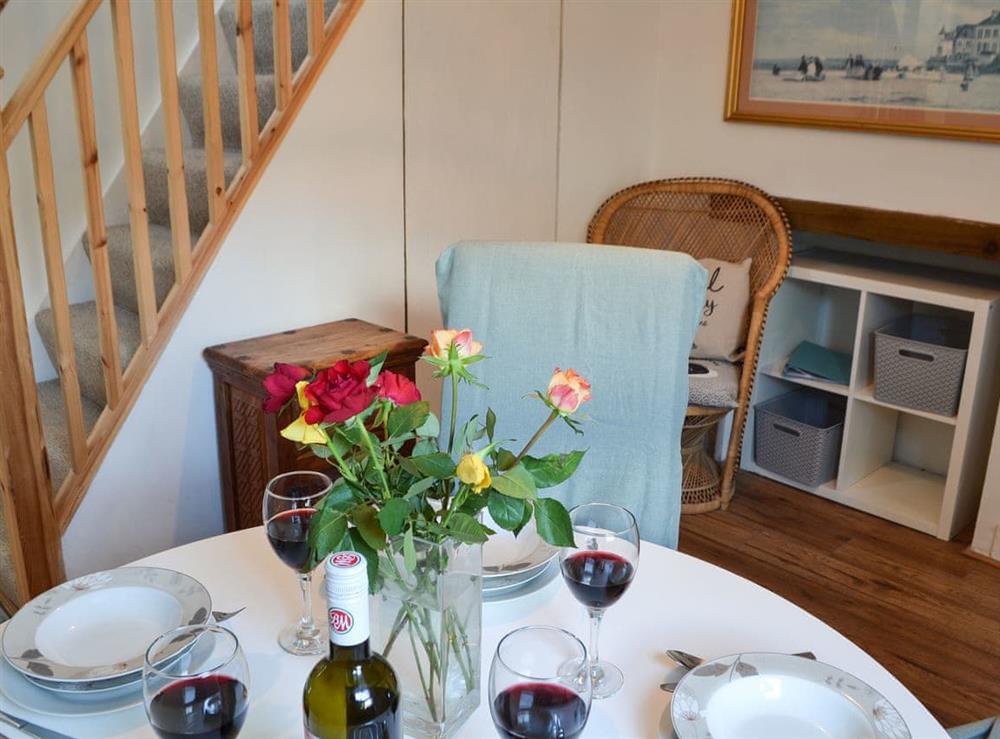 Dining area at Kingfisher Cottage in Worthing, West Sussex