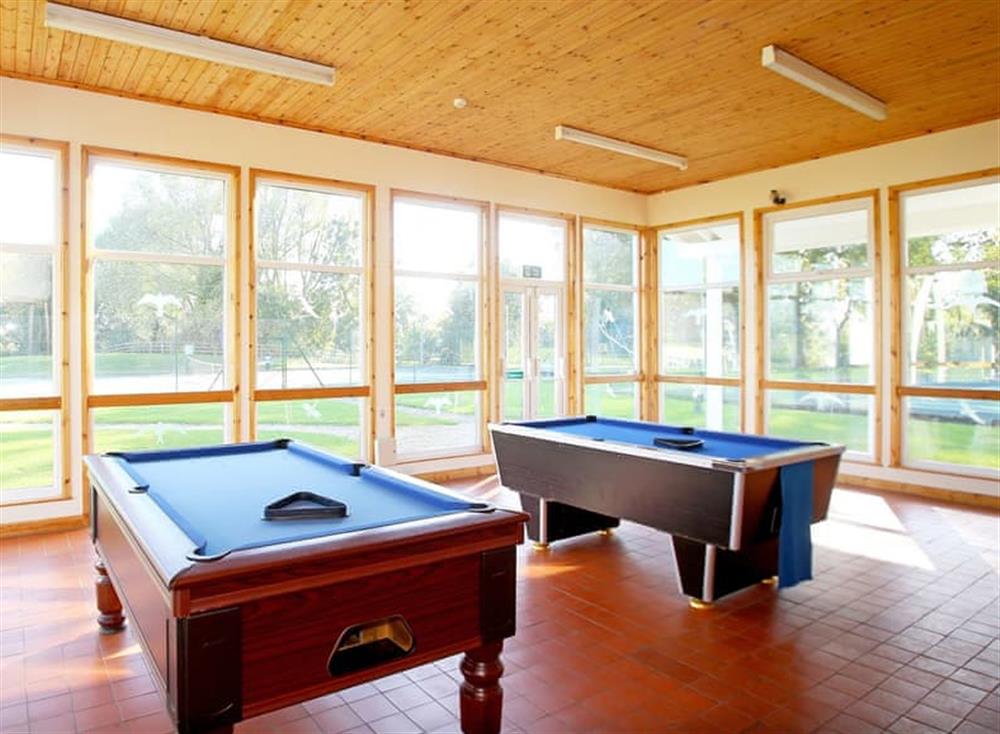 Games room at Kingfisher Lake House in Cotswold Lakes, Gloucestershire