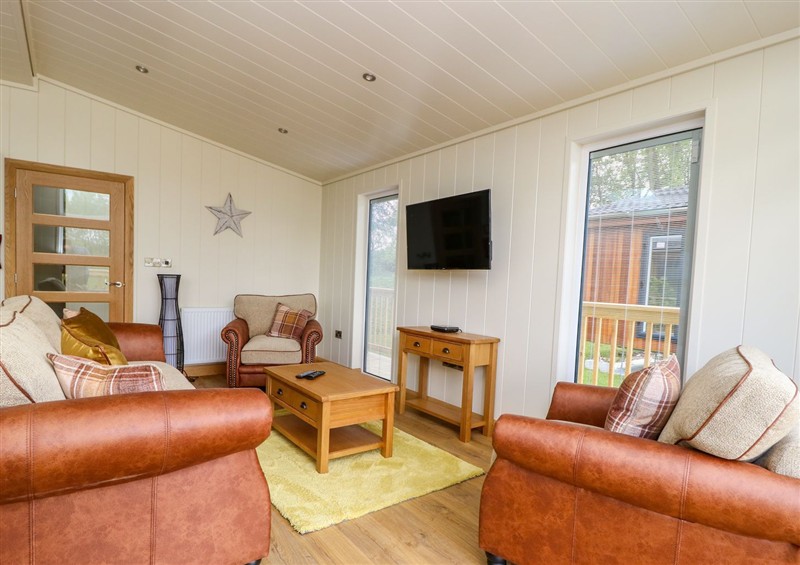 Relax in the living area at Kingfisher Lodge, Gargrave