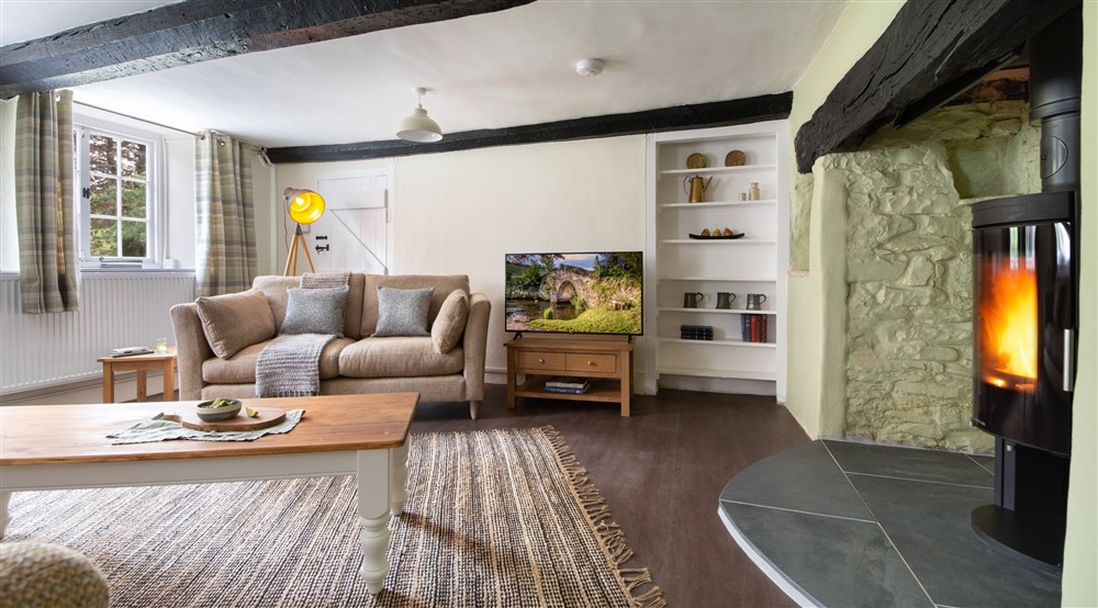 The open-plan kitchen, sitting and dining room at Kingfisher View in Lynton, North Devon