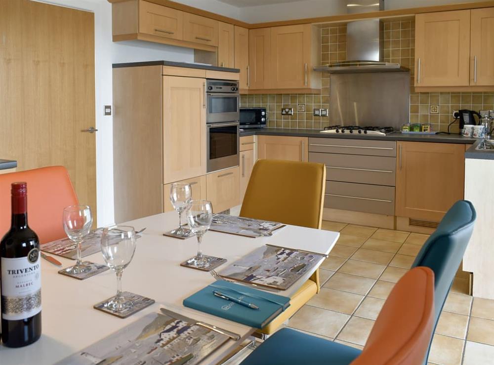 Spacious kitchen with dining area at Kings Haven in Mount Batten, near Plymouth, Devon