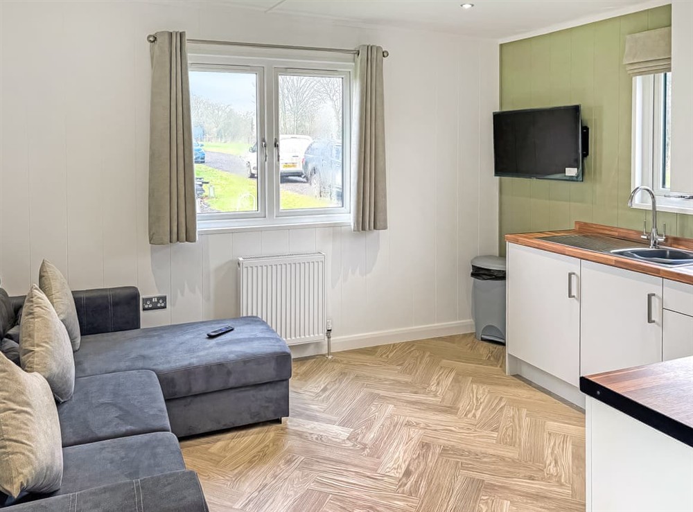 Open plan living space at Kings Moor Retreat 1 in Coleorton, near Coalville, Leicestershire