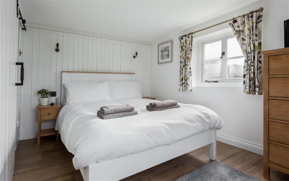 One of the bedrooms at Kingscliffe Cottage in Bashley