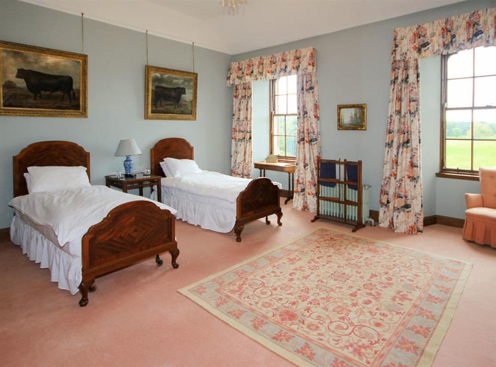 Spacious, comfortable twin bedroom at Macduff Tower, 