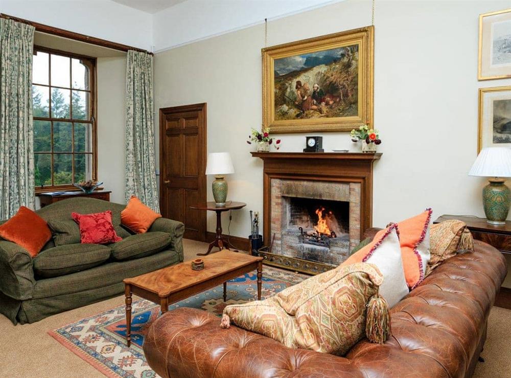 Stunning living room with an open fire at Macduff Tower, 