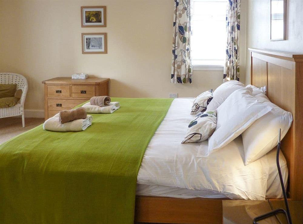 Relaxing double bedroom at Kirkbride Farmhouse in Carsluith, near Newton Stewart, Wigtownshire