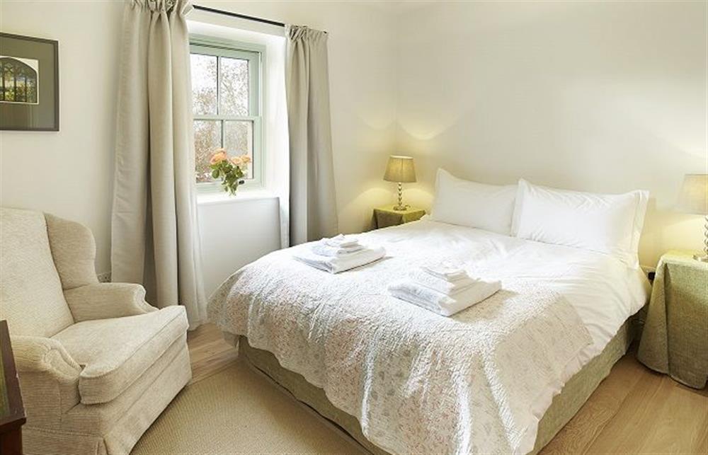 The Manor Room with three steps to a quiet private en suite bedroom with a king size (5ft) bed which can be arranged as two single beds upon request