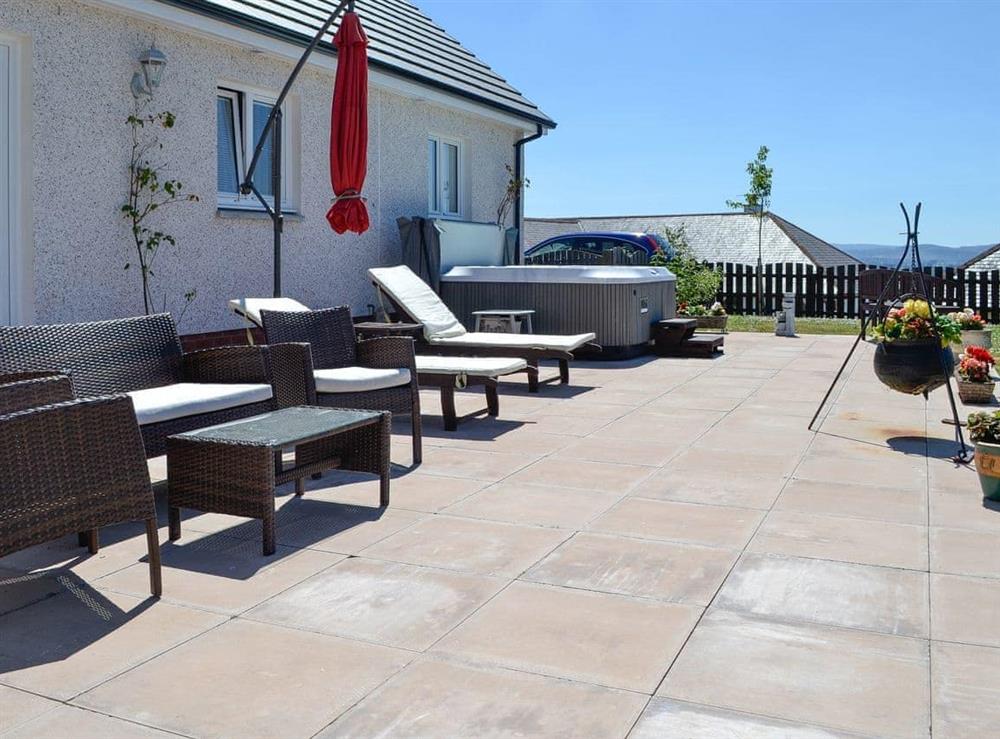 Patio with hot tub at Kirkland Burn in Tinwald, near Dumfries, Dumfriesshire