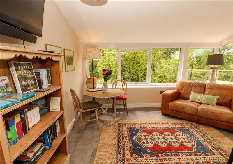 Relax in the living area (photo 2) at Kirkland Howe Cottage, Arlecdon