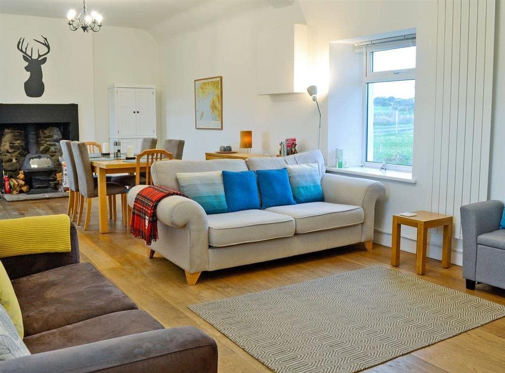 Living room/dining room (photo 2) at Kirklauchline Cottage in Stoneykirk, near Portpatrick, Wigtownshire