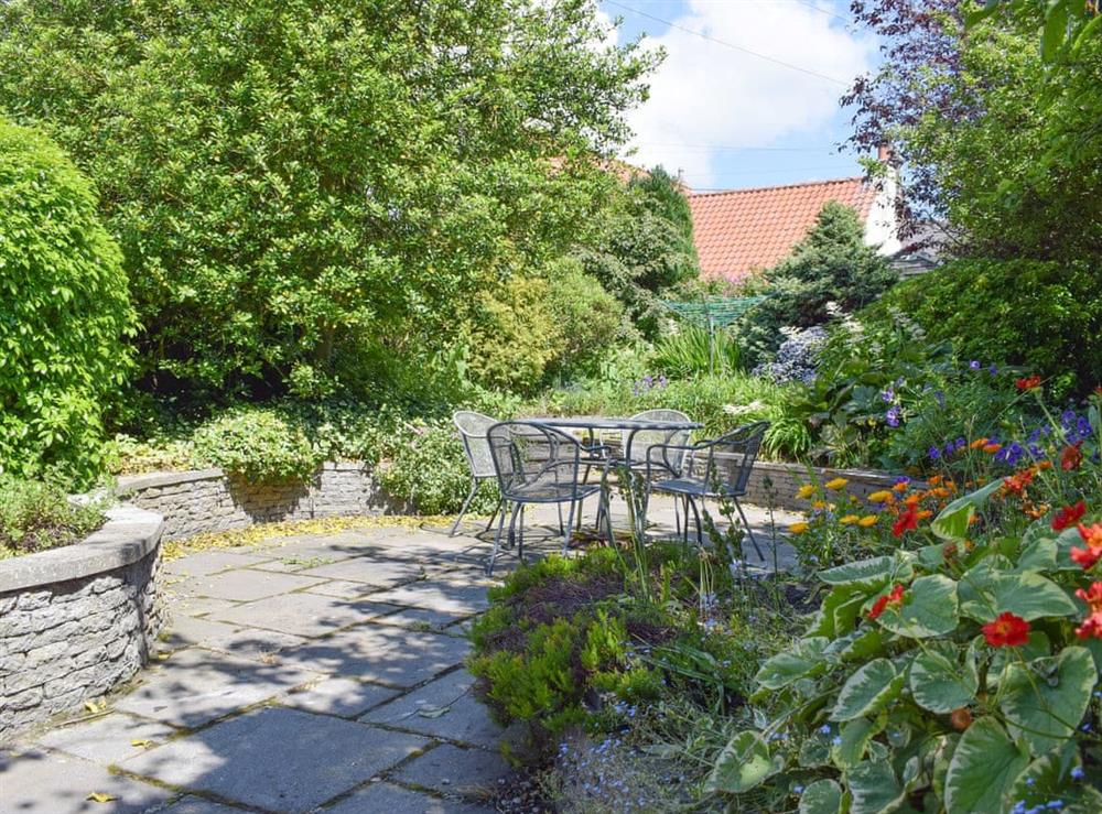 Well-maintained garden and patio area at Kirkview Cottage in Upper Largo, near Leven, Fife
