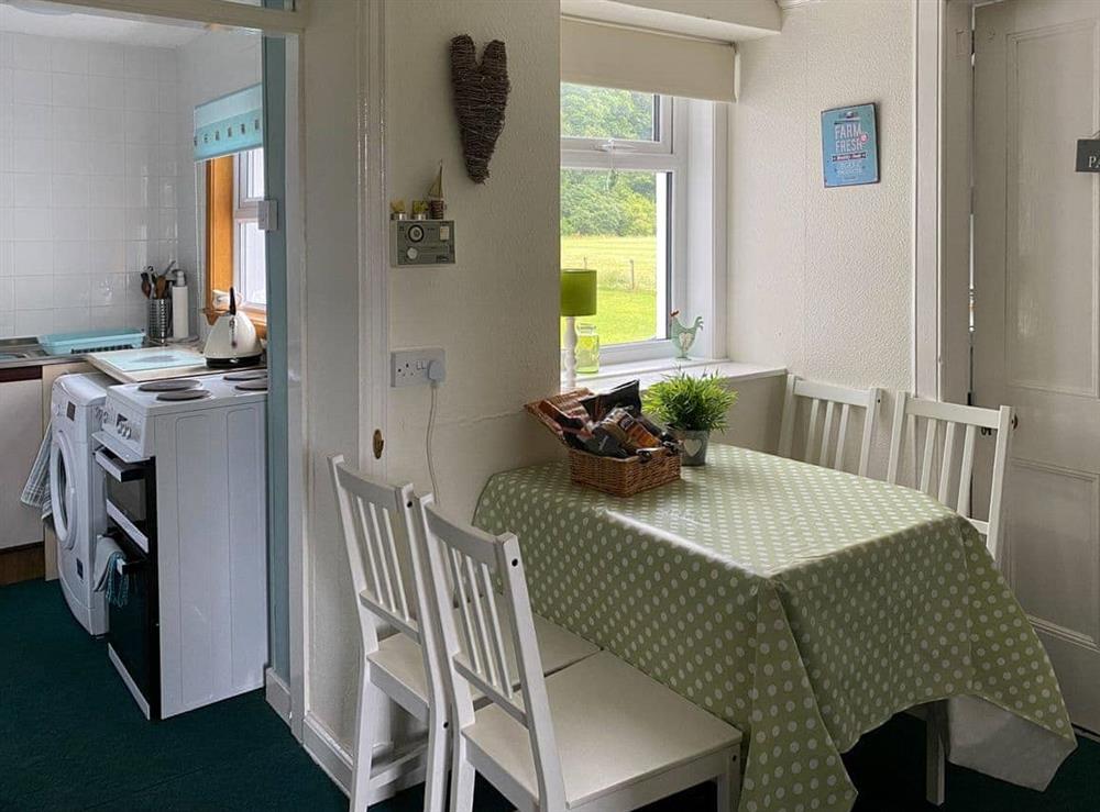 Light and airy breakfast/dining area which leads in to small kitchen and walk in pantry at Kirnan Cottage in Kilmichael Glassary, near Lochgilphead, Argyll
