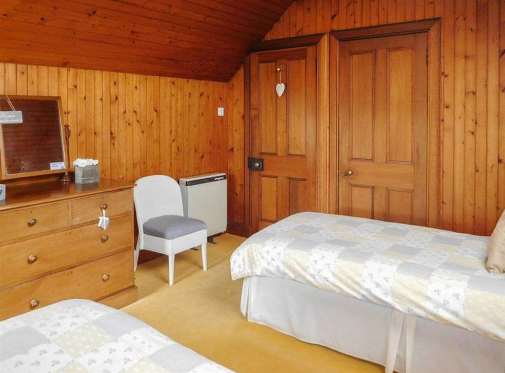 Lovely wood-clad twin-bedded room at Kirnan Cottage in Kilmichael Glassary, near Lochgilphead, Argyll