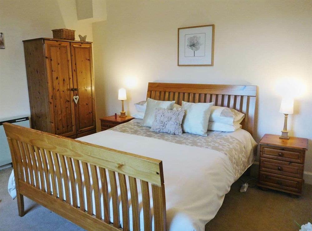 Relaxing king bedroom at Kirnan Cottage in Kilmichael Glassary, near Lochgilphead, Argyll