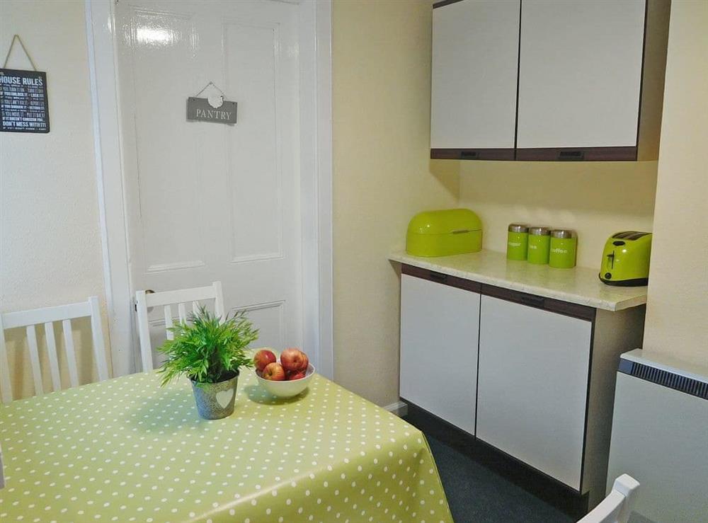 The Kitchen is split into 3 areas with ample storage in the quaint walk in pantry and breakfast area featured here at Kirnan Cottage in Kilmichael Glassary, near Lochgilphead, Argyll