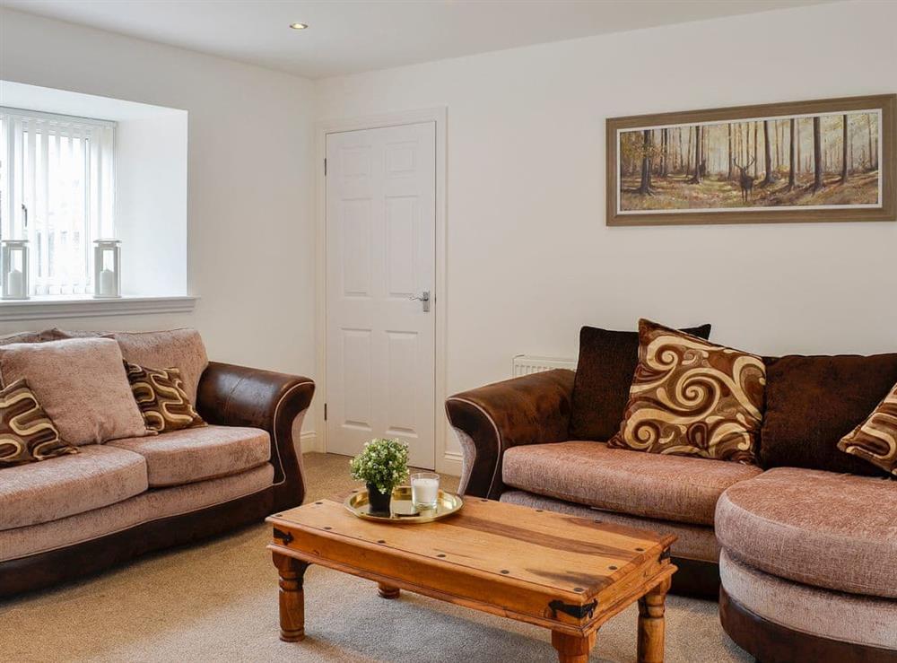 Welcoming living room at Kirroughtree Steading in Newton Stewart, Dumfries and Galloway, Wigtownshire