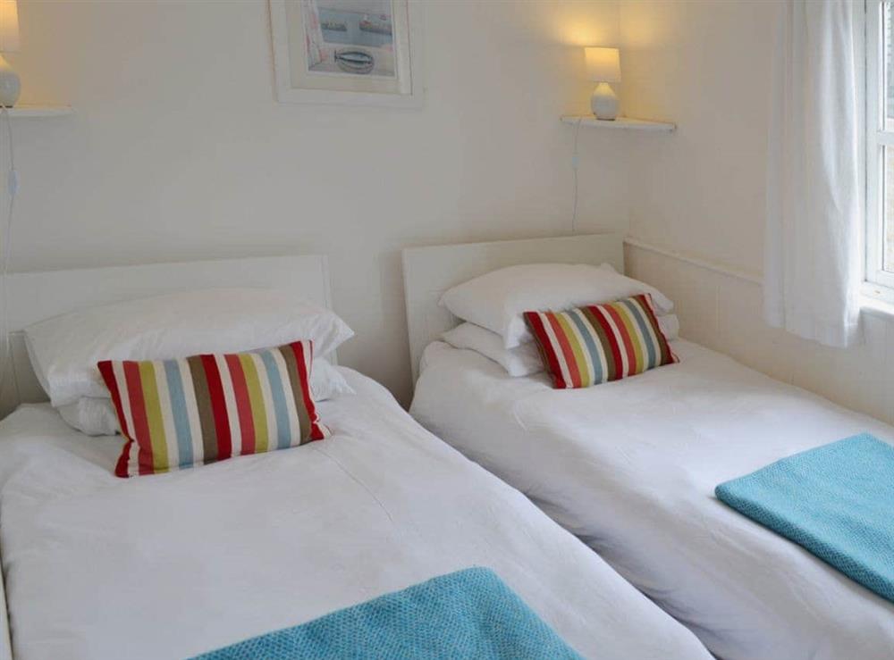 Twin bedroom at Kitchen Cottage in Mousehole, Penzance, Cornwall., Great Britain
