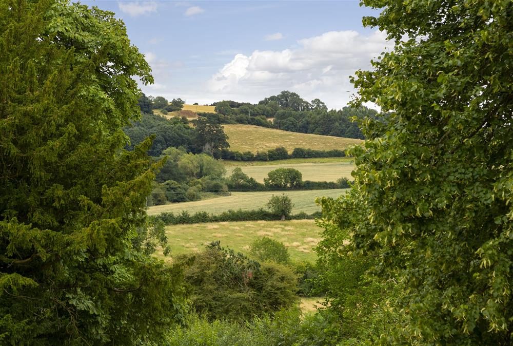 Stunning country views from the patio area at Kitchen Garden Cottage at Kitchen Garden Cottage, Barton-on-the-Heath