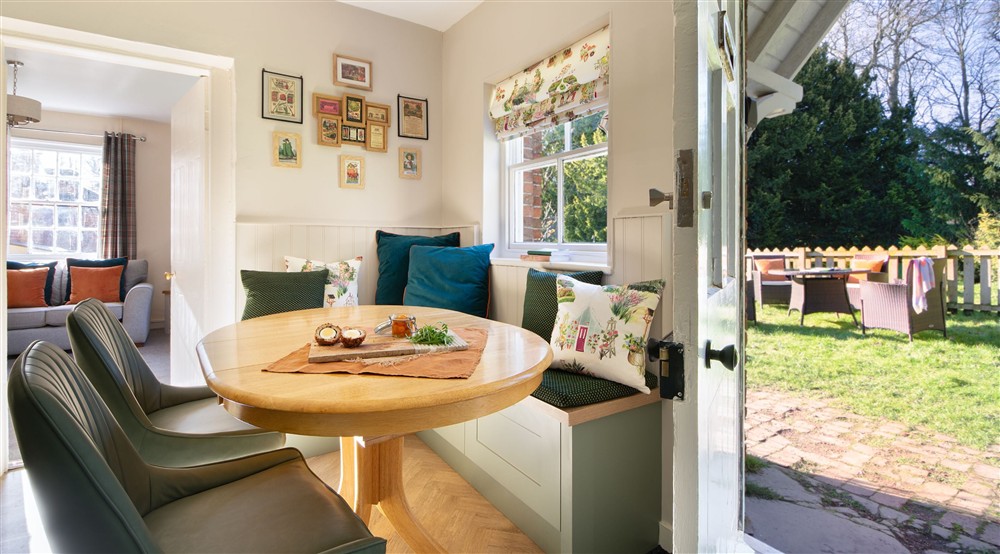 The dining table in the kitchen and dining room at Kitchen Garden Cottage in Worksop, Nottinghamshire