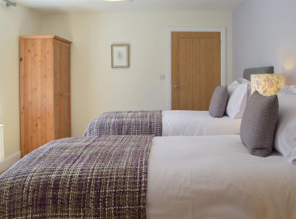 Twin bedroom at Kite Farm in Roch, Dyfed