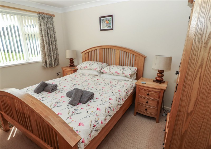 This is a bedroom at Kites - 52 Gower Holiday Village, Scurlage near Port Eynon and Rhossili