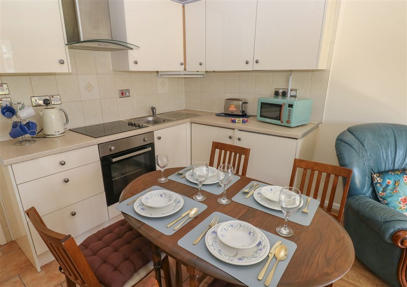 This is the kitchen at Kites - 52 Gower Holiday Village, Scurlage near Port Eynon and Rhossili
