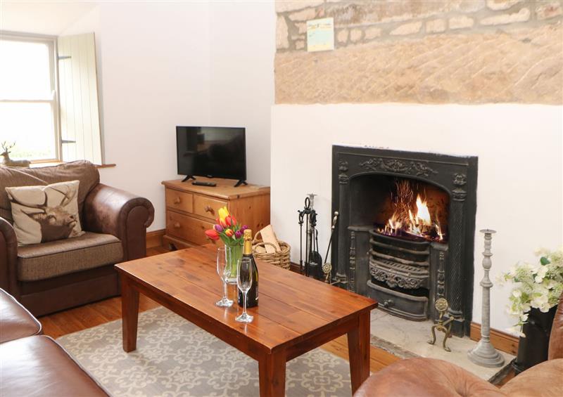 Relax in the living area at Kits Cottage, Middleton near Belford