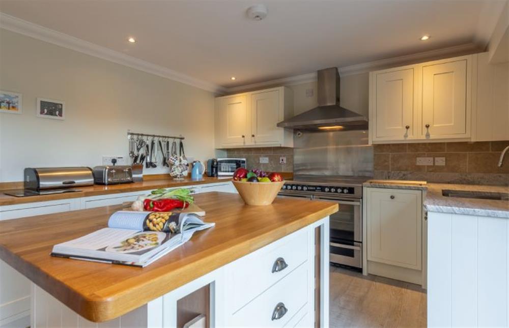 Ground floor: Beautifully made well-equipped kitchen at Kittiwake Cottage, Brancaster near Kings Lynn