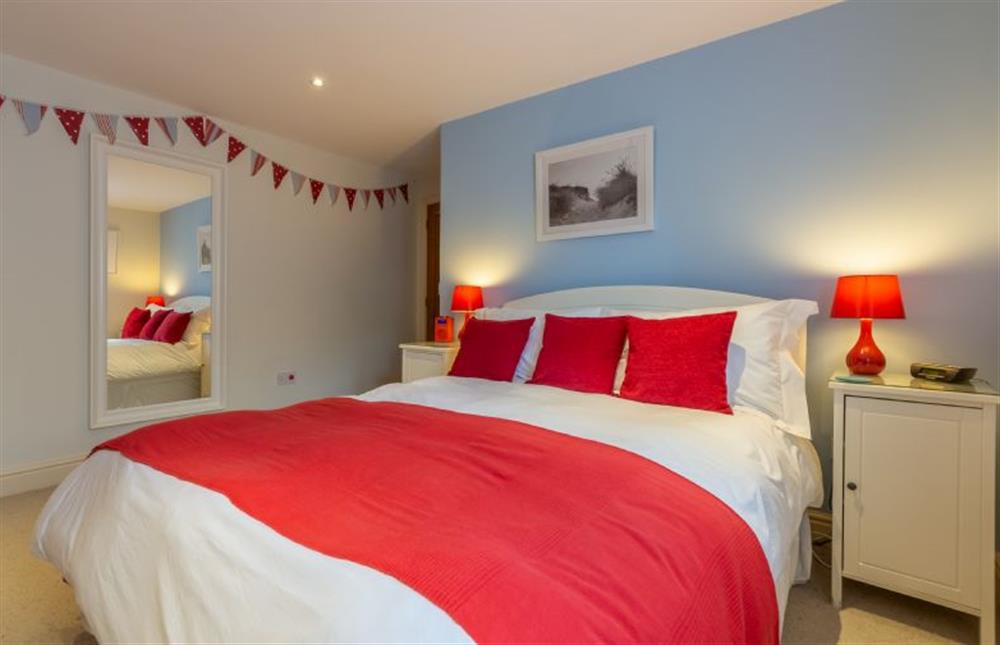 Ground floor: Bedroom three has a king-size bed (photo 2) at Kittiwake Cottage, Brancaster near Kings Lynn