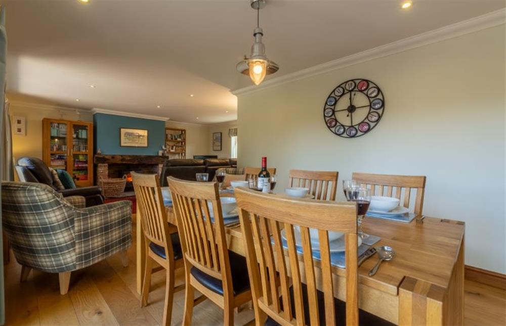 Ground floor: Dining area with plenty of seating for six at Kittiwake Cottage, Brancaster near Kings Lynn
