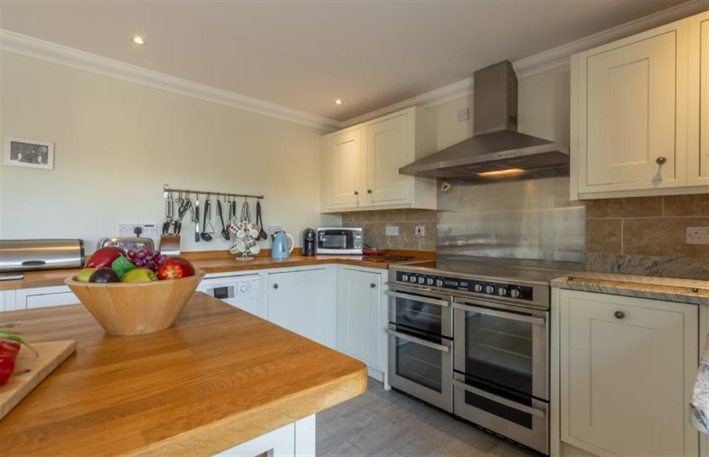 Ground floor: The kitchen has an electric Range cooker at Kittiwake Cottage, Brancaster near Kings Lynn