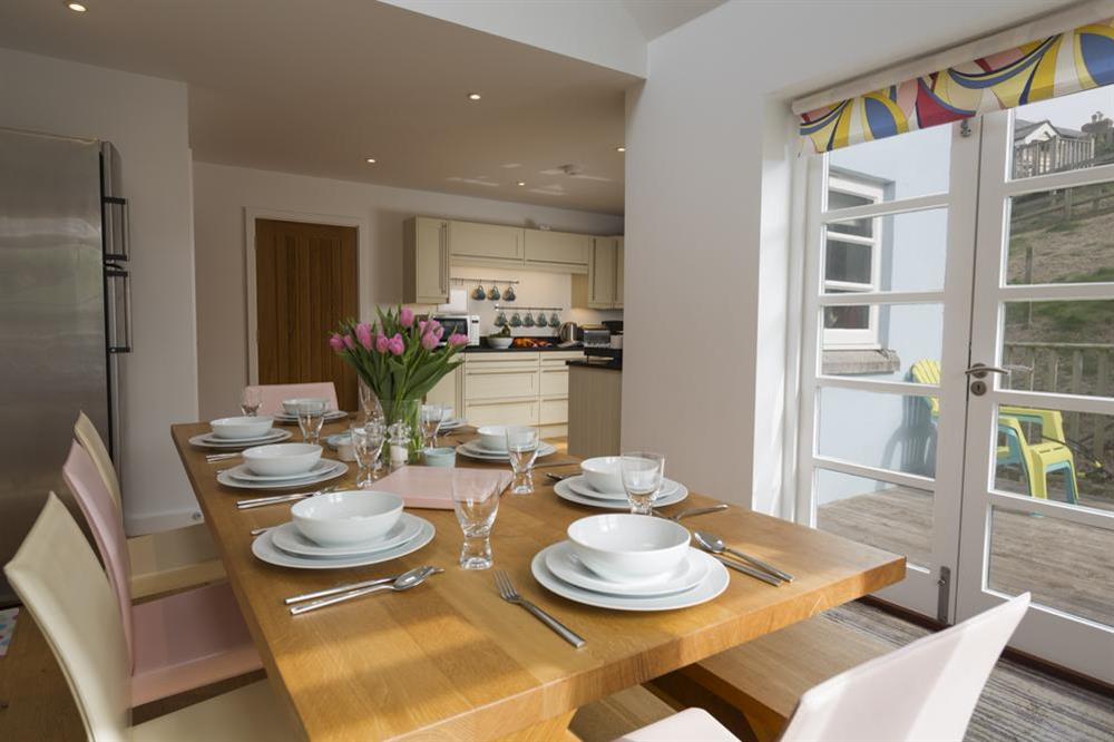 Open plan kitchen/dining room with double doors to terrace at Kittiwake in , Hallsands