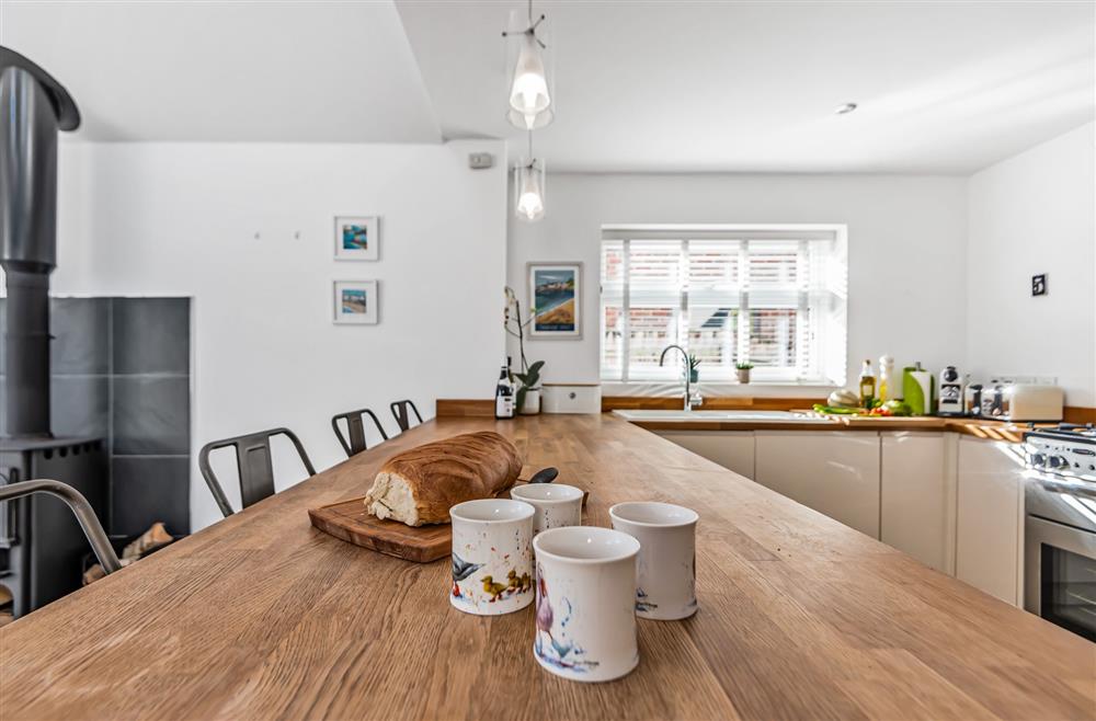 Kittiwake, Dorset: The bright, well-equipped kitchen offers plenty of space for preparing meals at Kittiwake, Highcliffe-on-Sea, Dorset