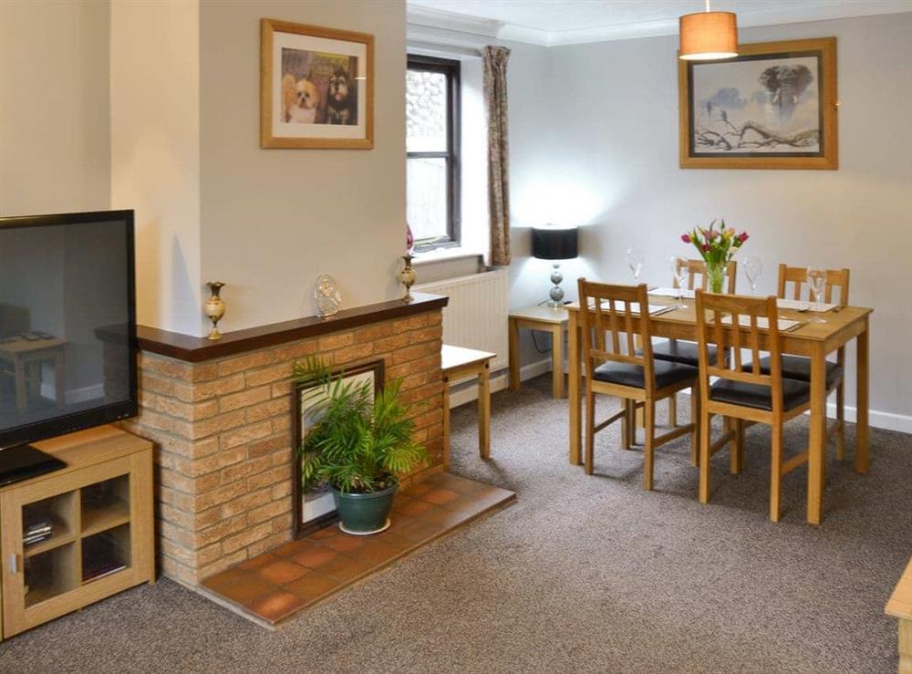 Stylish living and dining room at Kittiwake in Sheringham, Norfolk