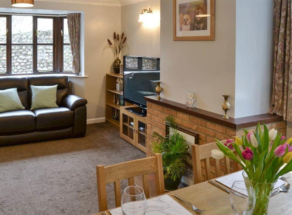 Welcoming living and dining room at Kittiwake in Sheringham, Norfolk