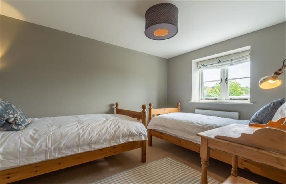 First floor: Bedroom three, twin room at Kitty Coot, Burnham Overy Staithe near Kings Lynn