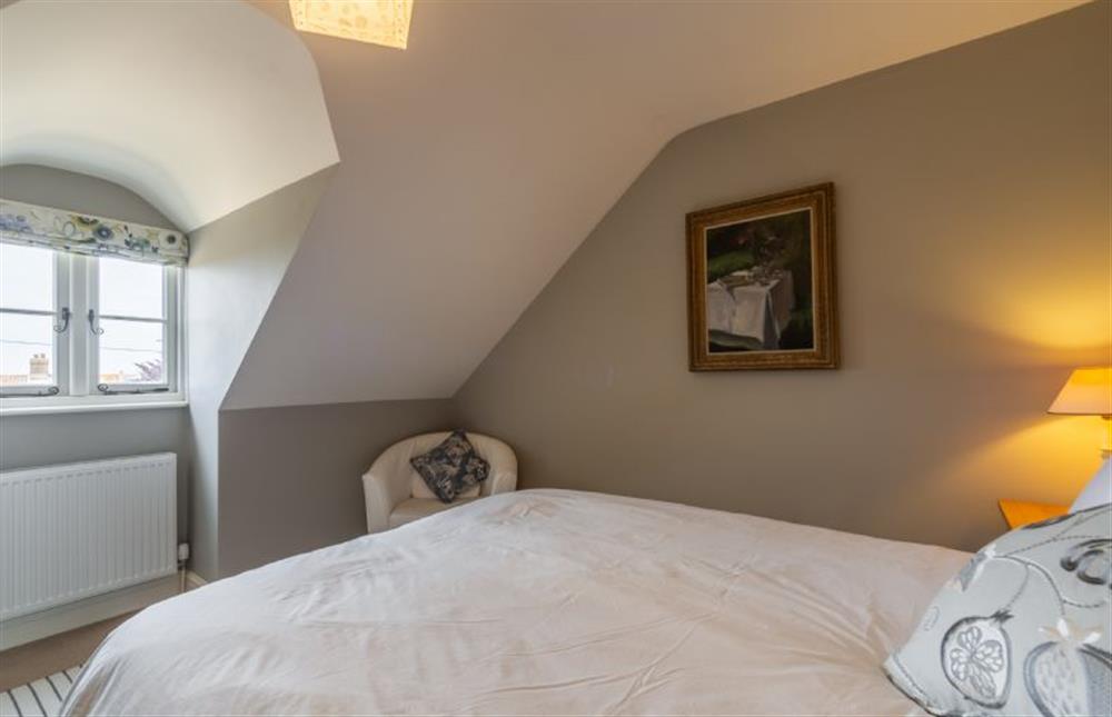 Second floor: Sea views from the master bedroom at Kitty Coot, Burnham Overy Staithe near Kings Lynn
