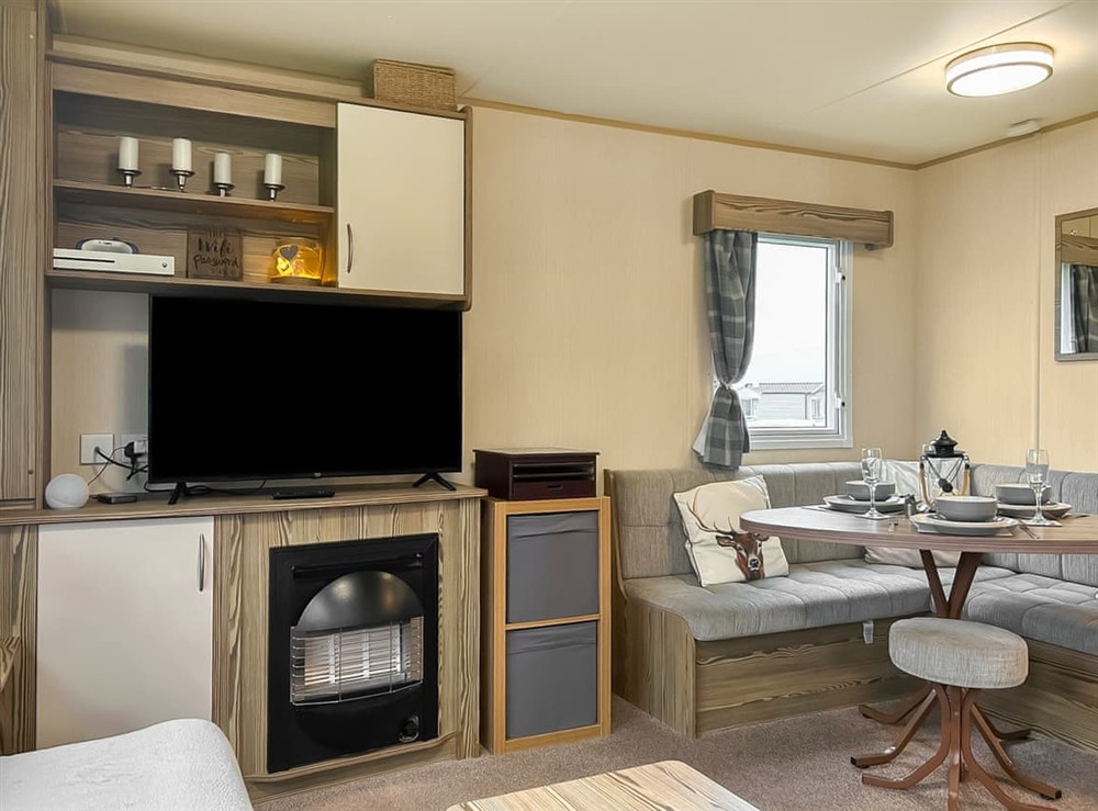 Open plan living space at Kjs Holiday Haven in Ayr, Ayrshire