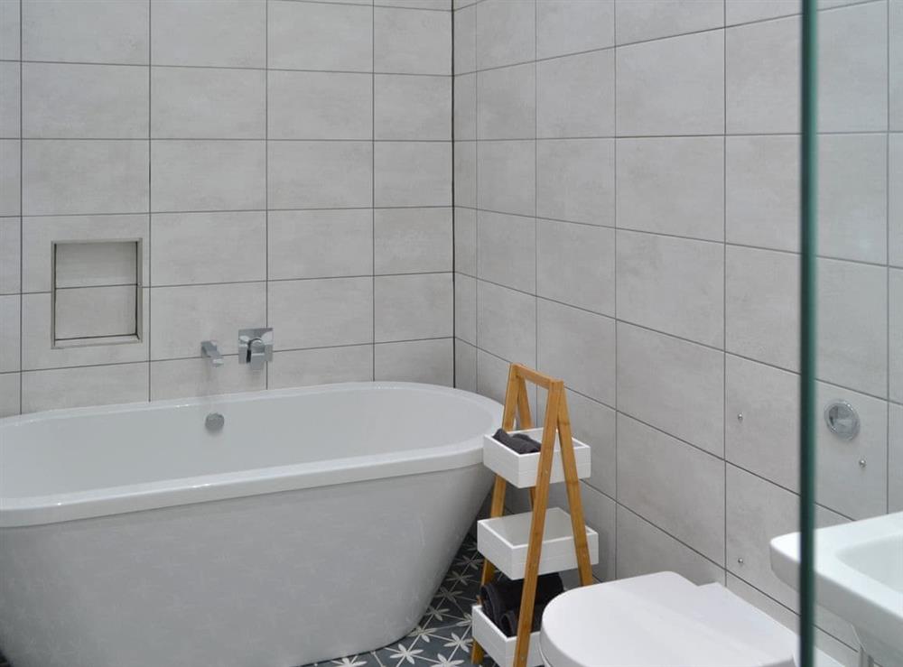 En-suite Bathroom with shower over bath (photo 2) at The Hemmel, 