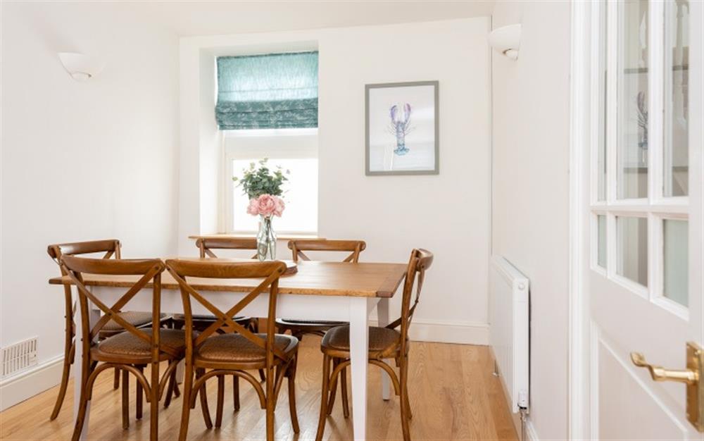 Dining area with seating for 6. at Knott Cottage in Dartmouth
