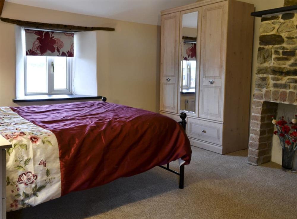 Double bedroom at Knotty Corner Cottage in Fairy Cross, near Bideford, Devon
