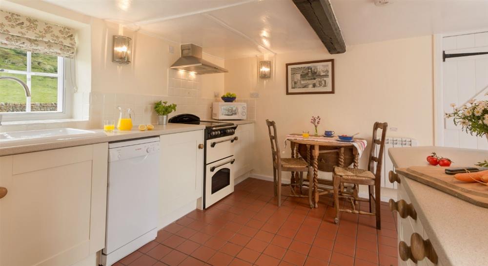 The kitchen and dining area at Knowles Farm Cottage in Ventnor, Isle Of Wight