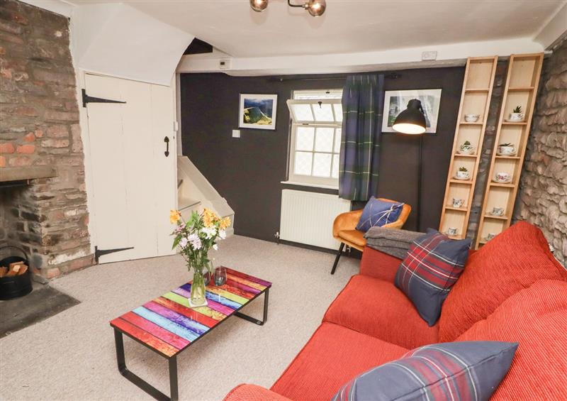 Relax in the living area at Kooky Cottage, Brecon