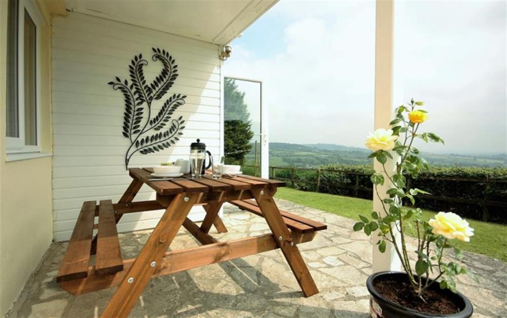 Enjoy dining with countryside views at Kowhai Cottage in Charmouth