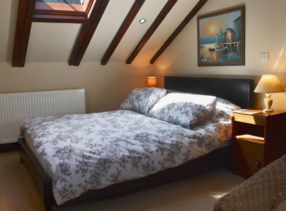 Comfortable double bedroom with additional single bed (photo 2) at Kris Kin in Criccieth, Gwynedd., Great Britain