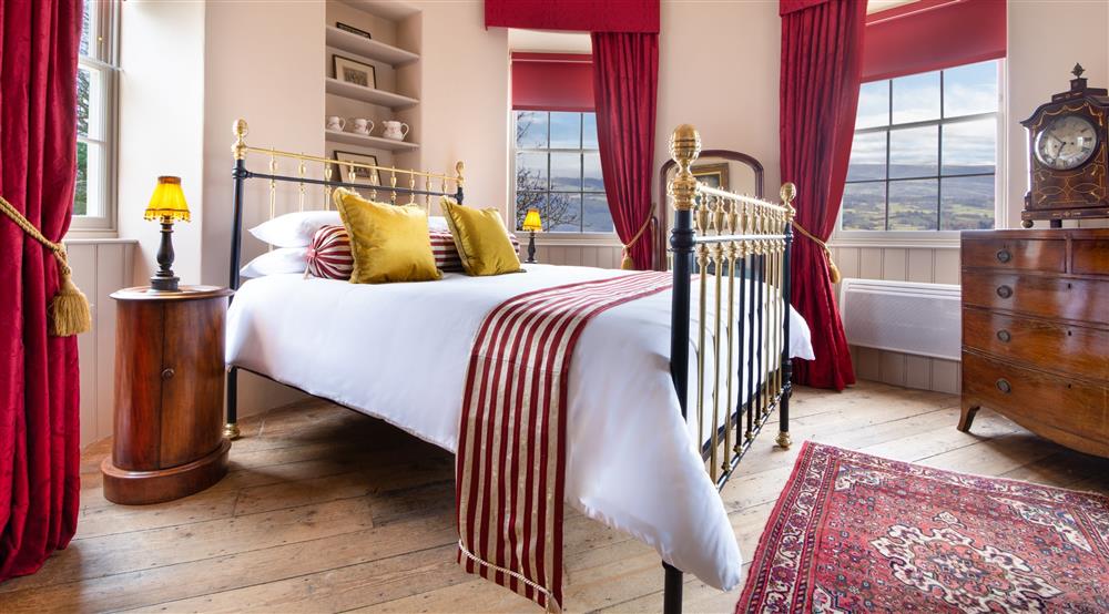 The bedroom at Kymin Round House in Monmouth, Monmouthshire